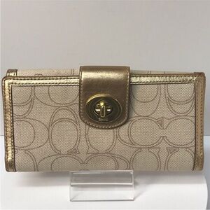 Coach Gold and Tan Turn Lock Signature Wallet